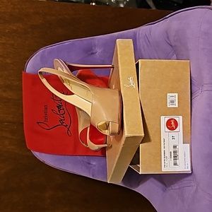 Christian Louboutin Red Bottom heels in Nude color